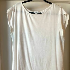 Buttons down the back, flutter sleeve cream knit top.